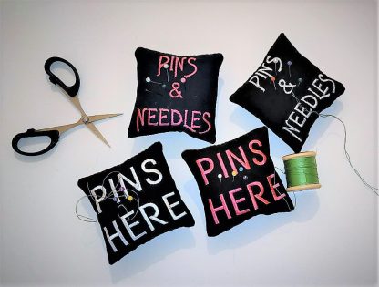 Pin cushions with text